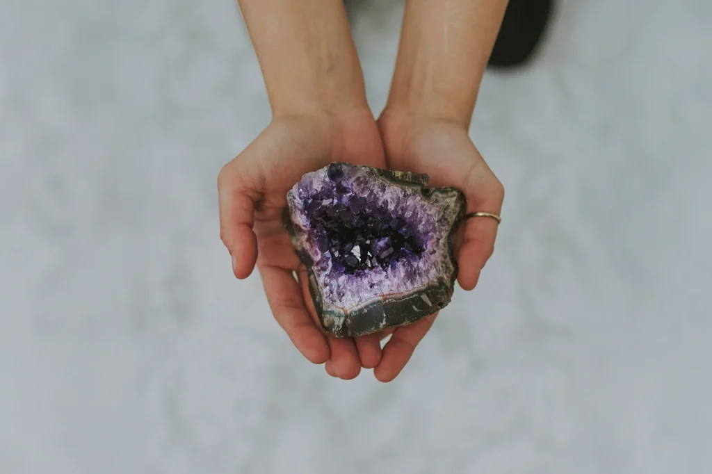 Close-up of raw amethyst crystals showing their natural purple structure.