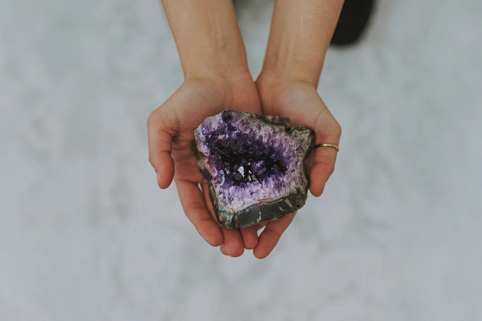 Close-up of raw amethyst crystals showing their natural purple structure.