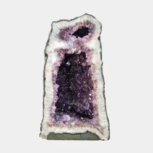 Front view of the 48 cm Amethyst Cathedral revealing its tall vertical structure, deep violet crystals, and soft quartz framing.