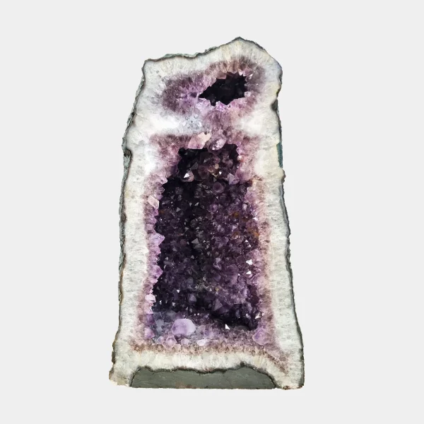Front view of the 48 cm Amethyst Cathedral revealing its tall vertical structure, deep violet crystals, and soft quartz framing.