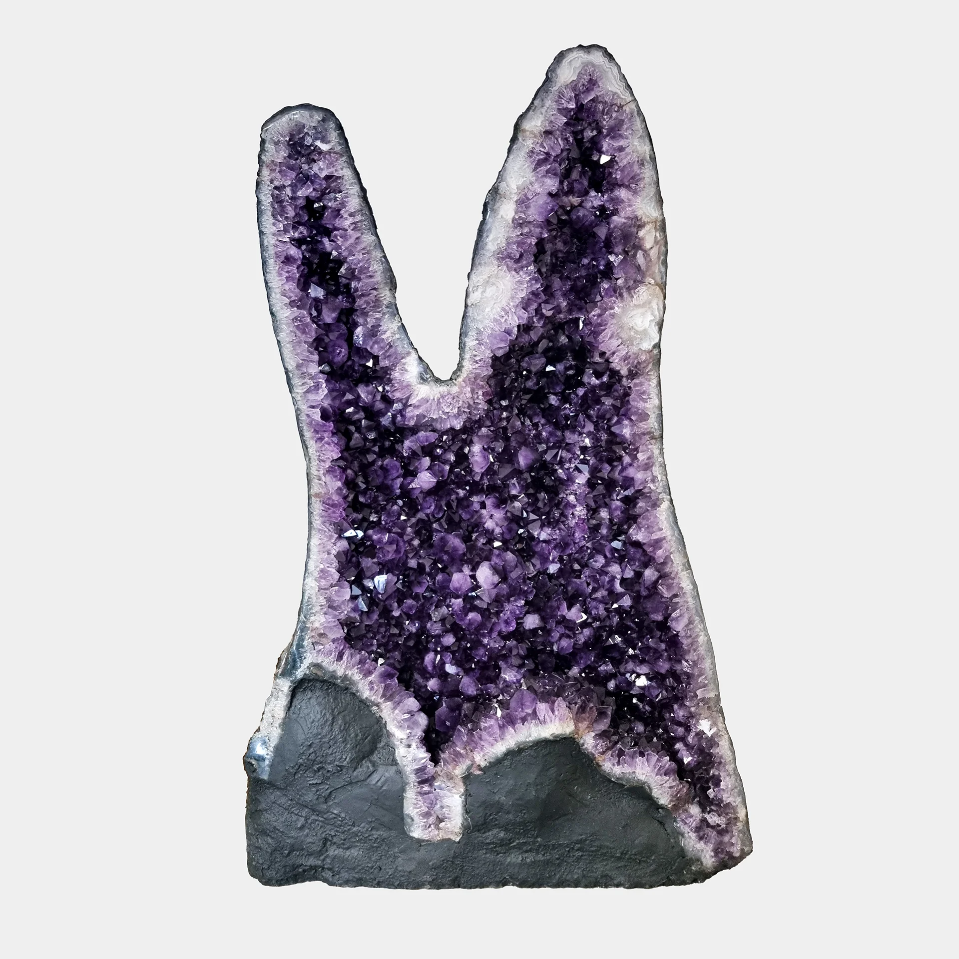 Amethyst Statement Piece N°5 – 117 cm – Front View Front view of a tall twin-peak Amethyst formation with dense violet crystals.
