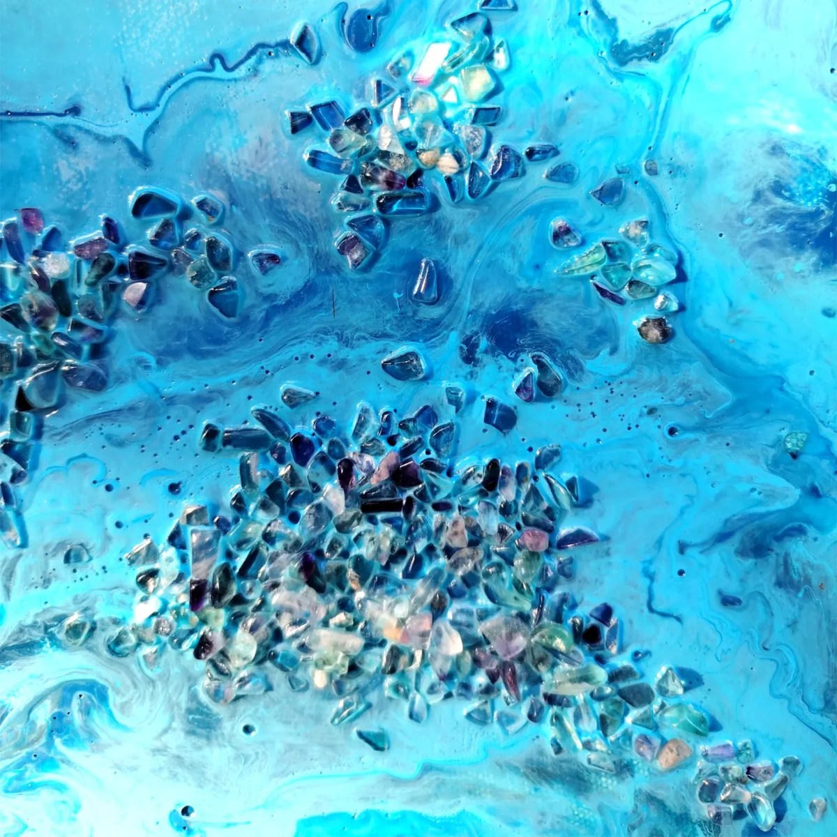 Crystal detail with fluorite and amethyst chips set into vivid blue paint