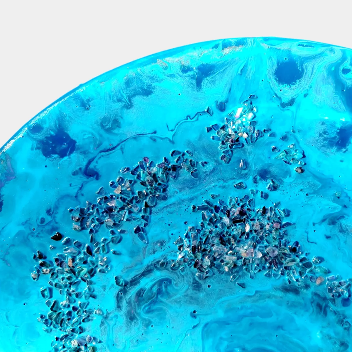 Edge detail of the painting with clustered crystals and flowing blue tones