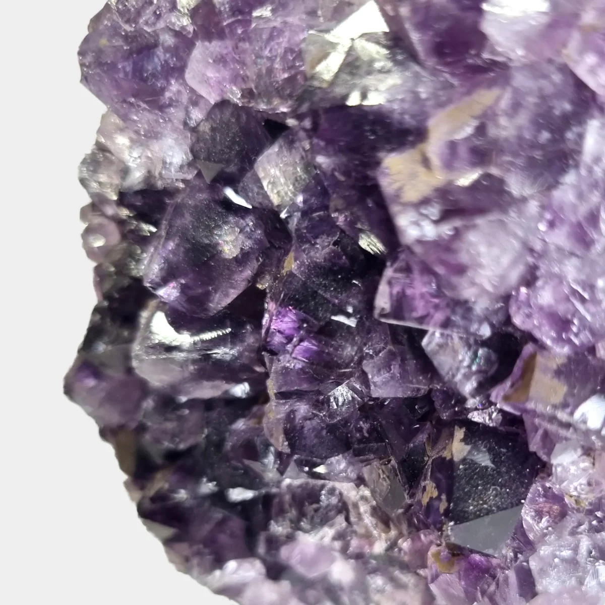 Close-up of dark violet amethyst crystal points in an amethyst cluster.