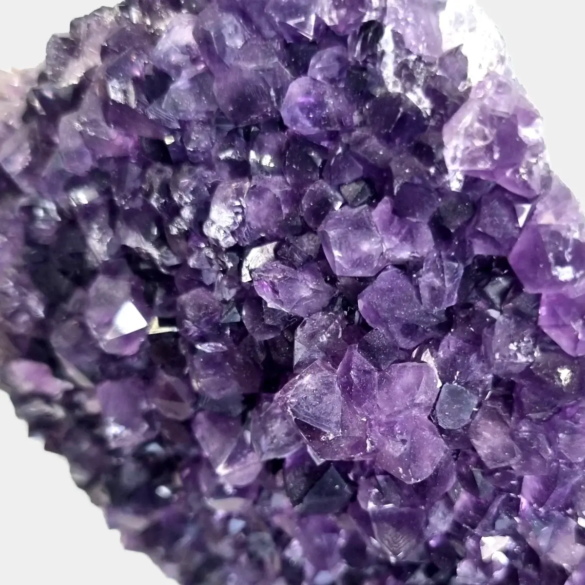 Close-up of purple amethyst crystal points in an amethyst cluster.