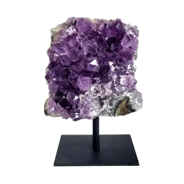Front view of an amethyst cluster on a black metal stand with purple crystal points and pale natural stone.
