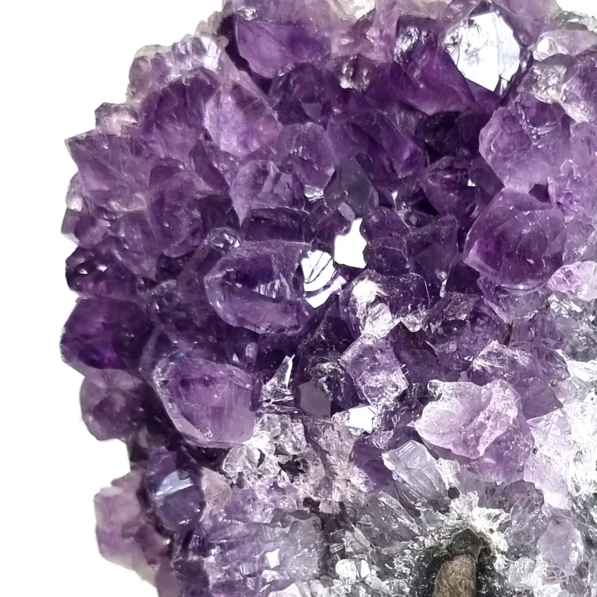 Close-up of purple amethyst crystal points in an amethyst cluster.